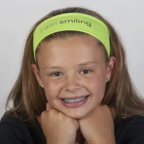 I am smiling™ neon yellow headband