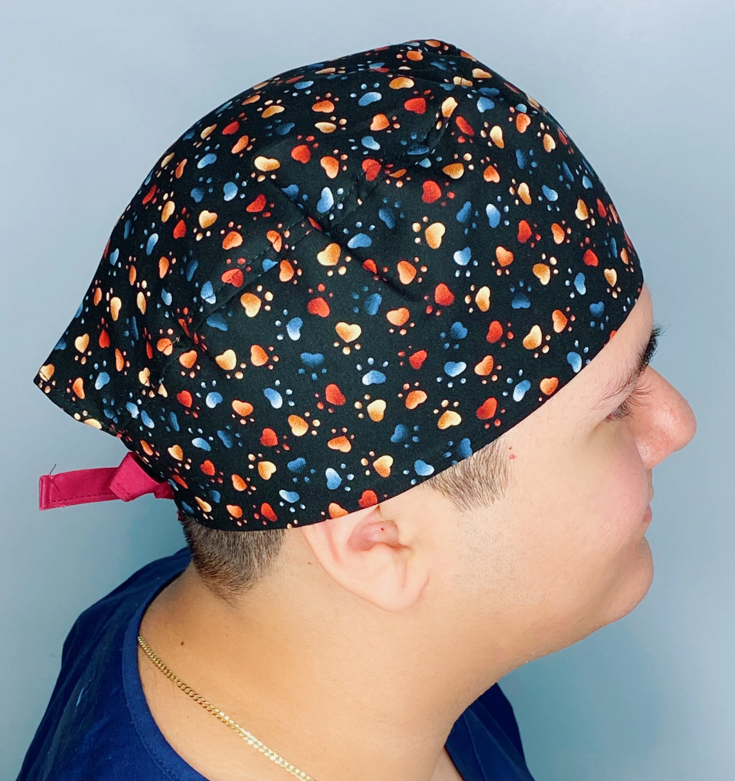 Neutral Toned Paws on Black Unisex Animal Scrub Cap