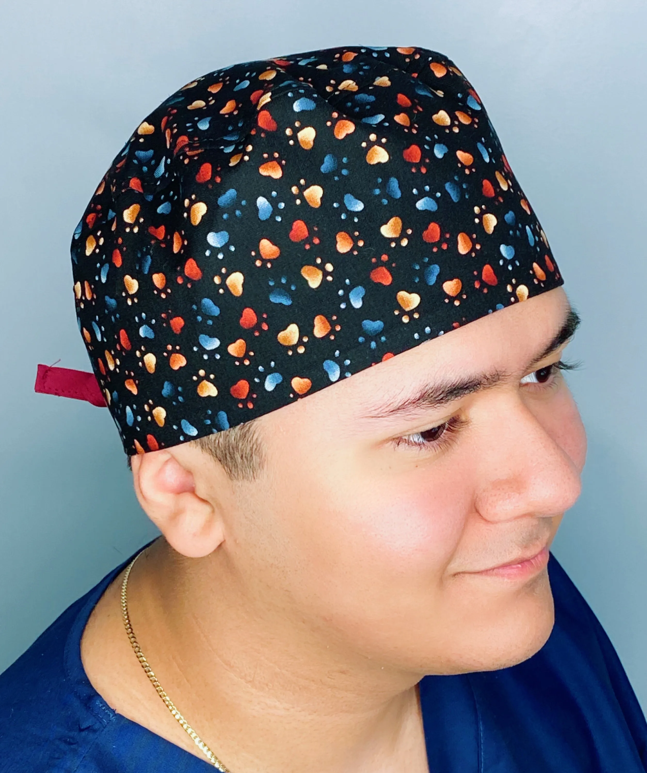 Neutral Toned Paws on Black Unisex Animal Scrub Cap