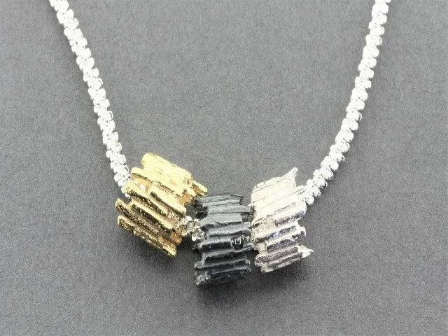 Tubular sticks pendant - Silver , Gold Oxidized on 55cm chain