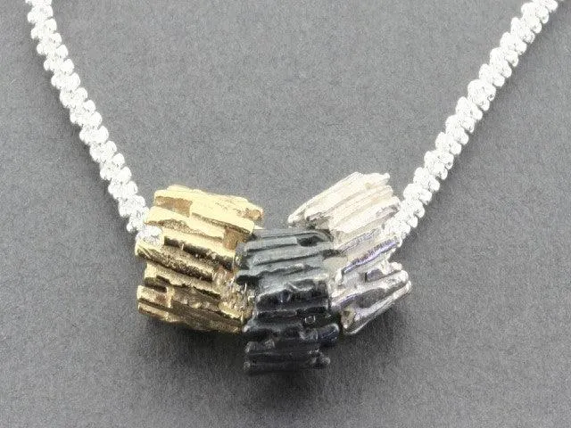Tubular sticks pendant - Silver , Gold Oxidized on 55cm chain